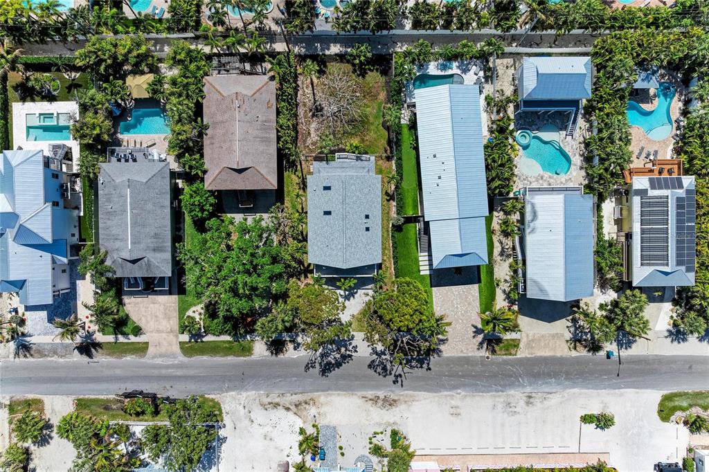 517 Spring Avenue Anna Maria, FL 34216 - Photo 46 of 50 an aerial view of multiple house
