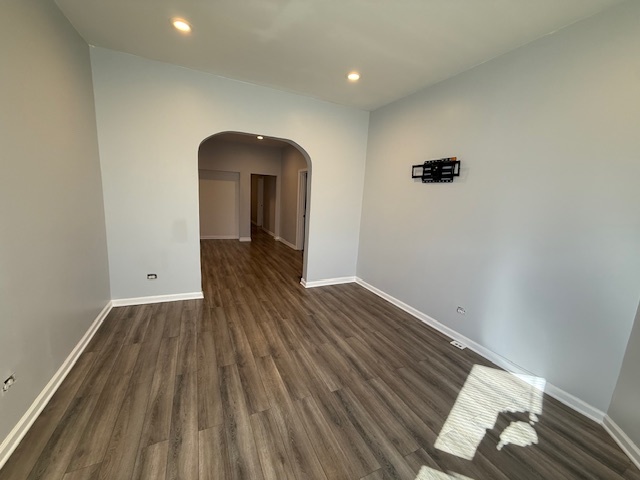 7336 South Emerald Avenue Chicago, IL 60621 - Photo 3 of 11 a view of a room with wooden floor