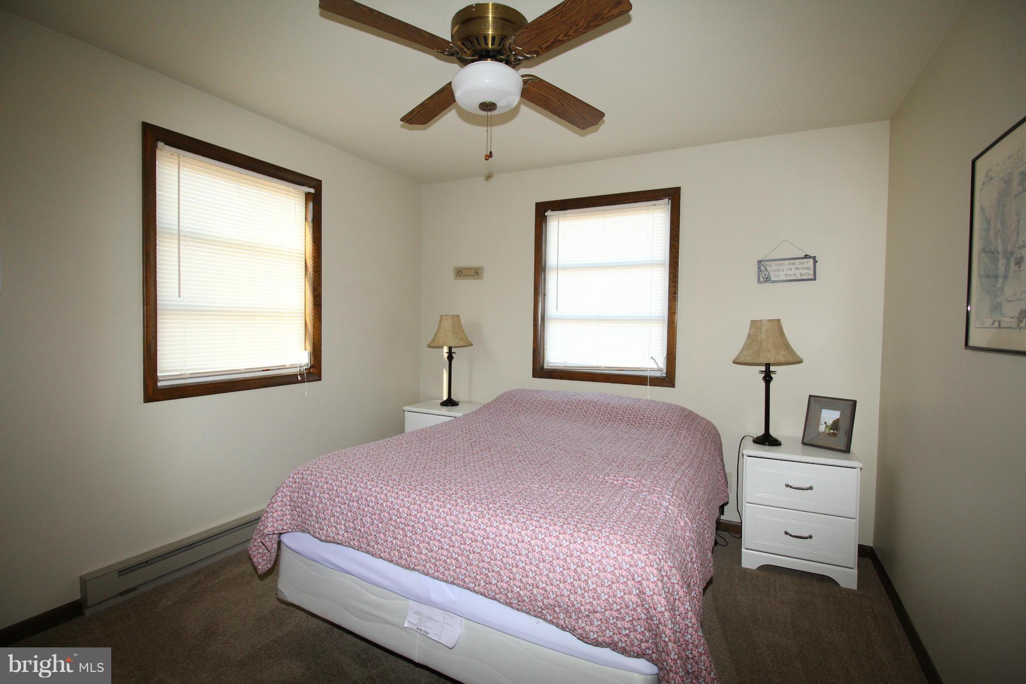 116 Basin Road Earleville, MD 21919 - Photo 22 of 25 a bedroom with a bed and a window