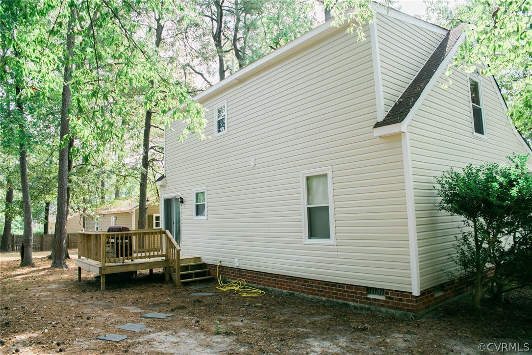 3206 Roland View Terrace Chester, VA 23831 - Photo 27 of 29 a view of a small house with a yard and furniture