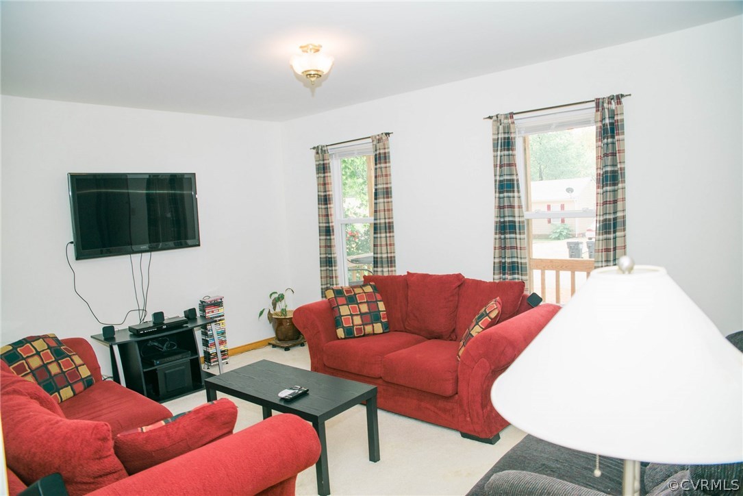 3206 Roland View Terrace Chester, VA 23831 - Photo 6 of 29 a living room with furniture and a flat screen tv