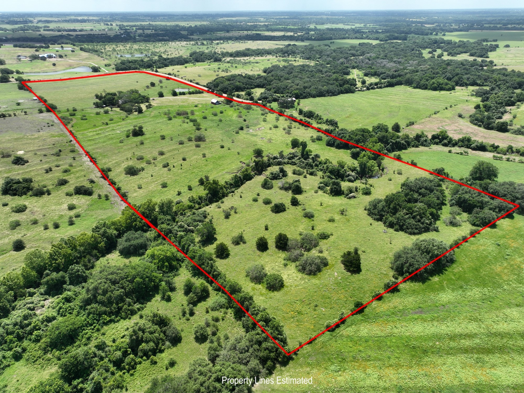 5208 Mensik Road Schulenburg, TX 78956 - Photo 13 of 34 Rear NW Corner with Property Lines Estimated