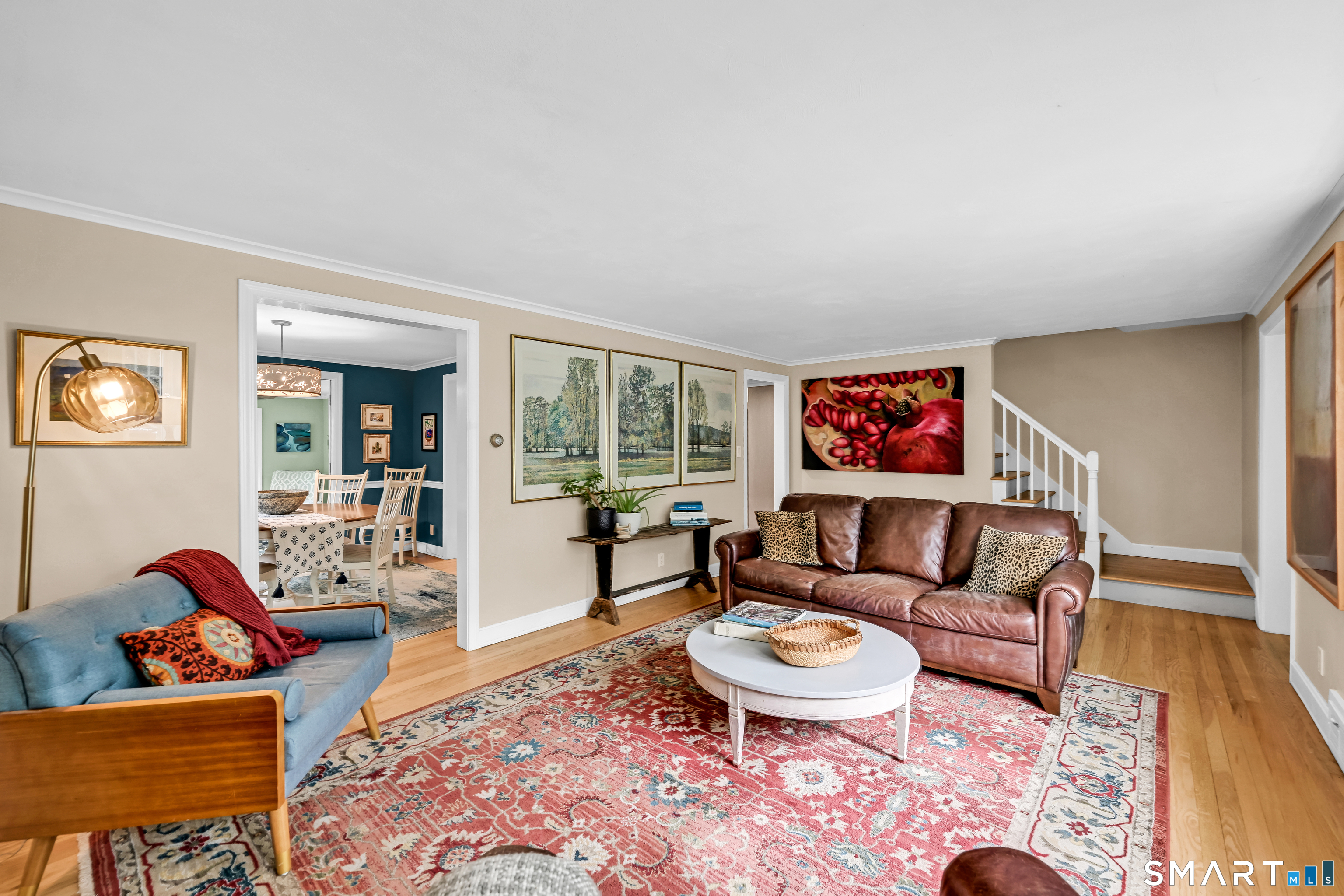 47 Spring Lane West Hartford, CT 06107 - Photo 5 of 38 a living room with furniture and a rug