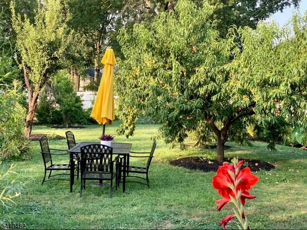 a view of a table and chairs in patio