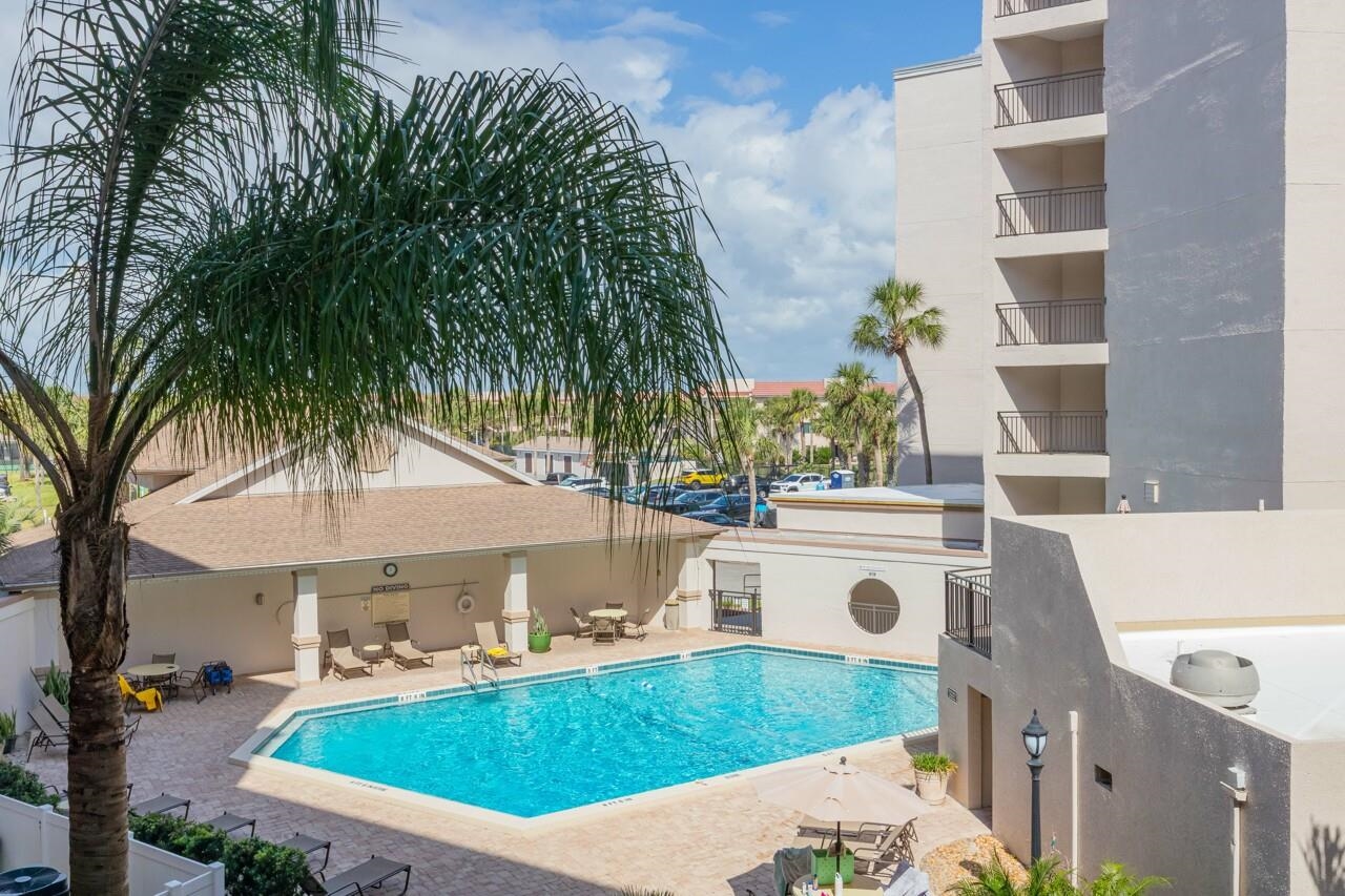 2 Dondanville Road, Unit 304 St. Augustine, FL 32080 - Photo 19 of 43 a view of a house with a swimming pool