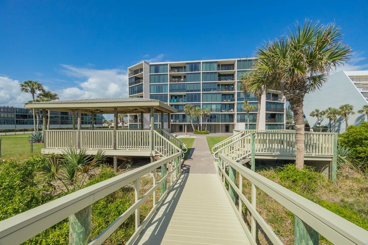 2 Dondanville Road, Unit 304 St. Augustine, FL 32080 - Photo 36 of 43 a view of balcony with a large window and wooden fence