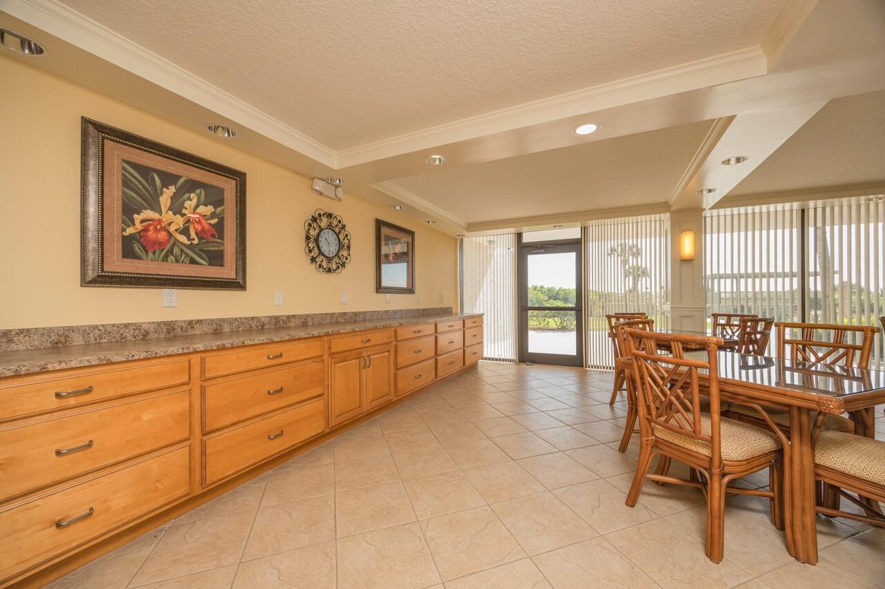 2 Dondanville Road, Unit 304 St. Augustine, FL 32080 - Photo 42 of 43 a view of a dining room with furniture and window
