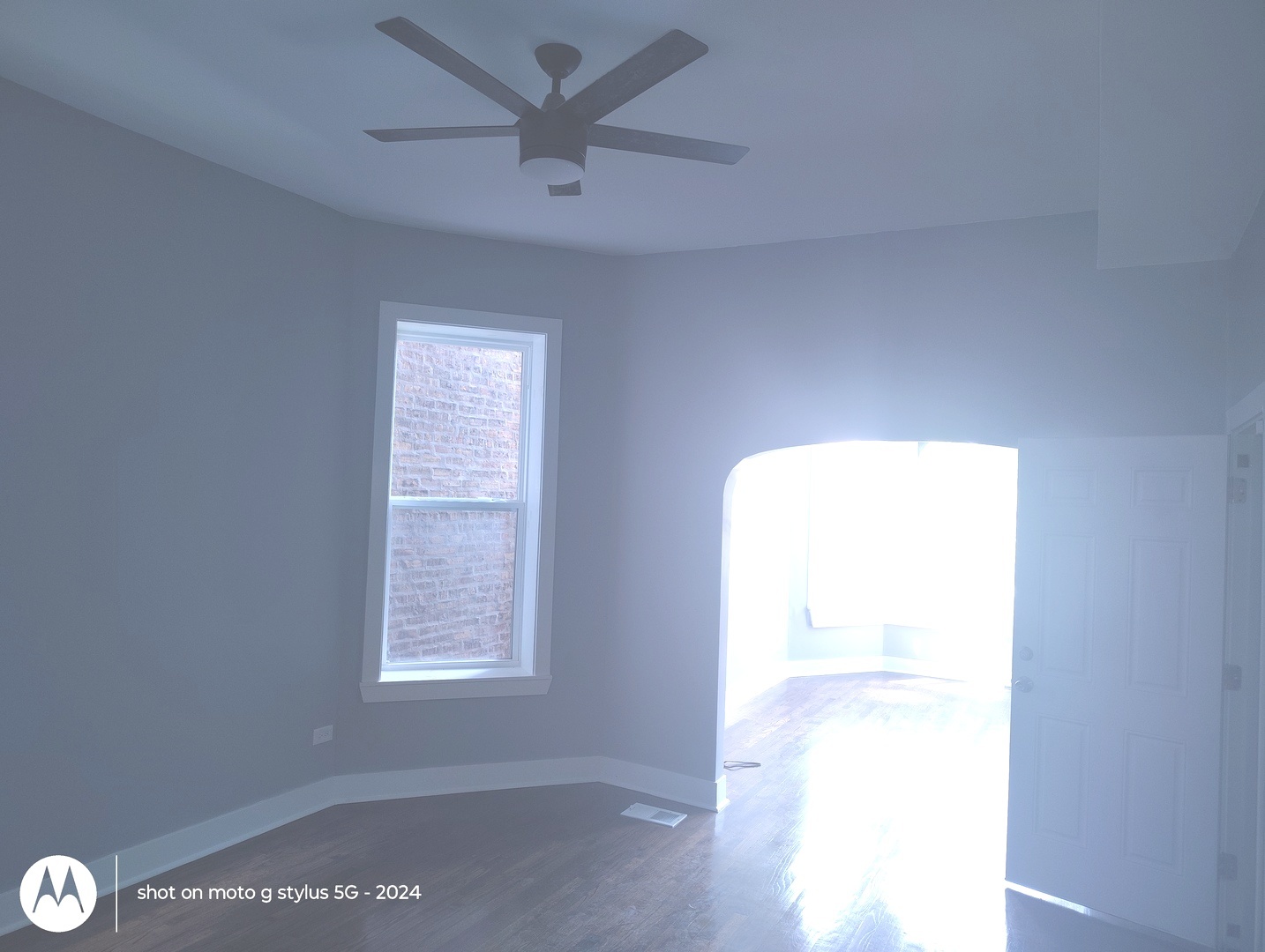 1661 South Homan Avenue, Unit 1 Chicago, IL 60623 - Photo 5 of 11 an empty room with a window