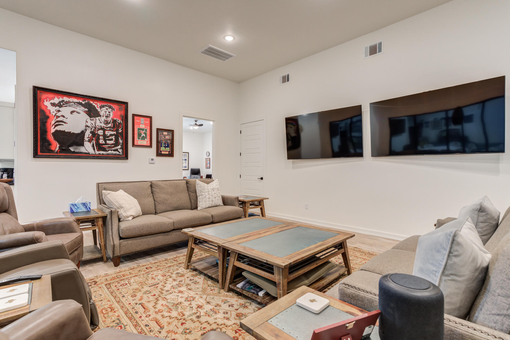 3405 107th Street Lubbock, TX 79423 - Photo 15 of 41 a living room with furniture a rug and a flat screen tv