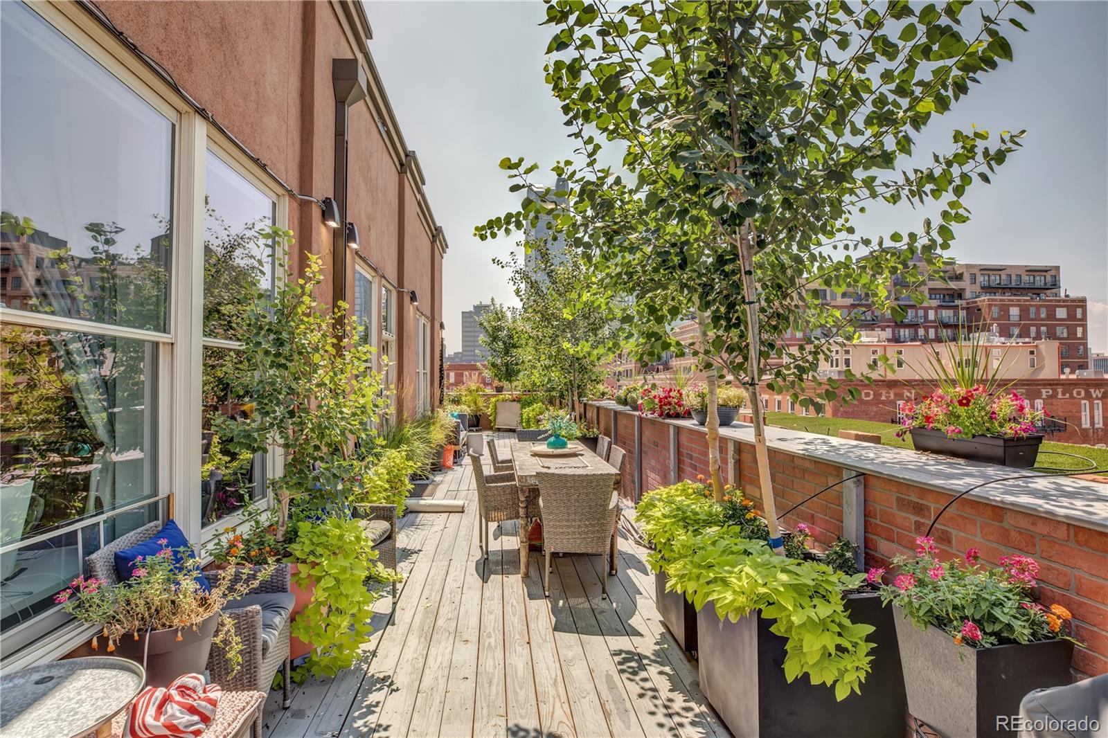 1501 Wazee Street, Unit 4B Denver, CO 80202 - Photo 22 of 40 a view of a chairs and table in a patio