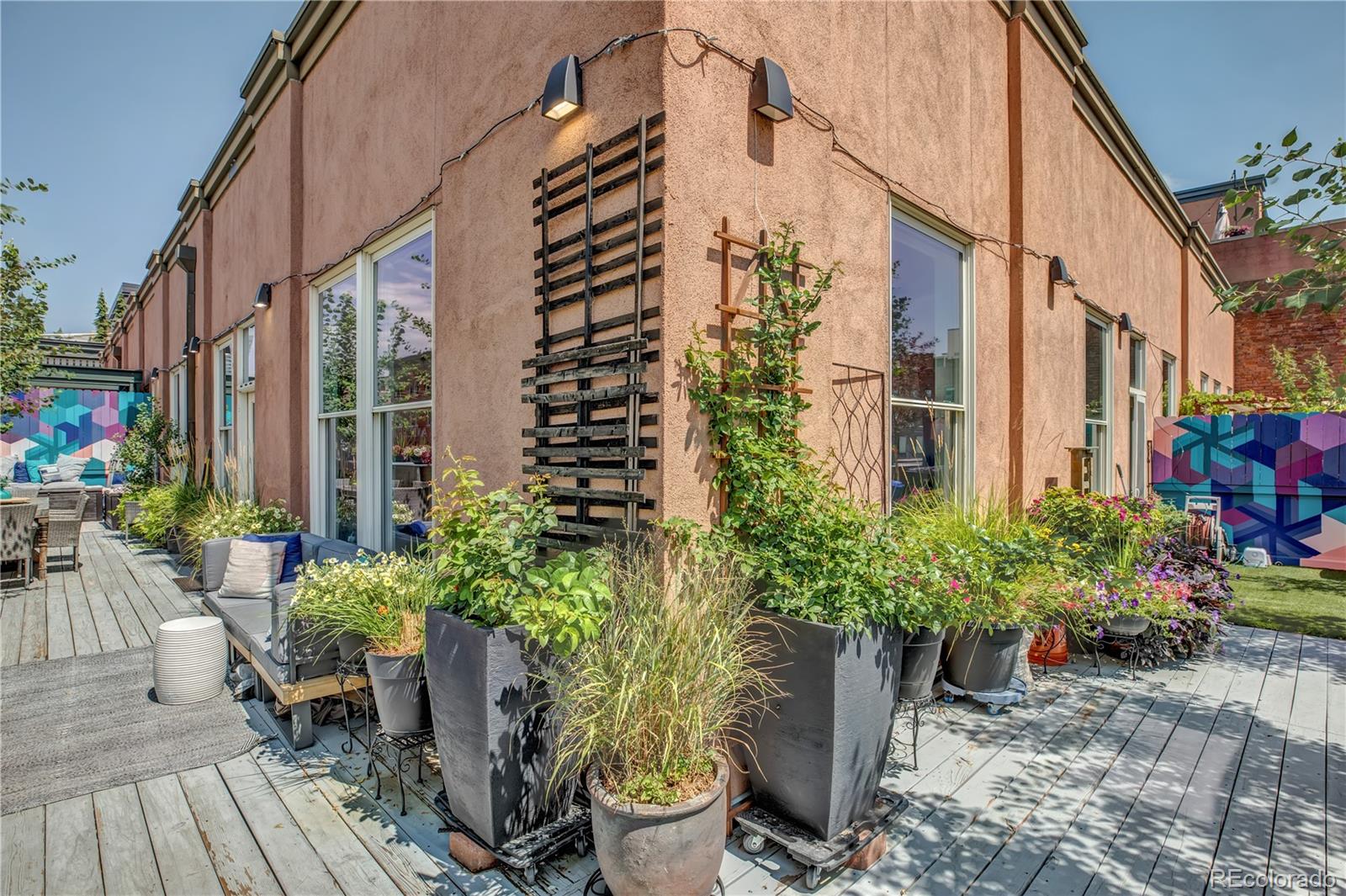 1501 Wazee Street, Unit 4B Denver, CO 80202 - Photo 26 of 40 a view of a potted plants on a sidewalk