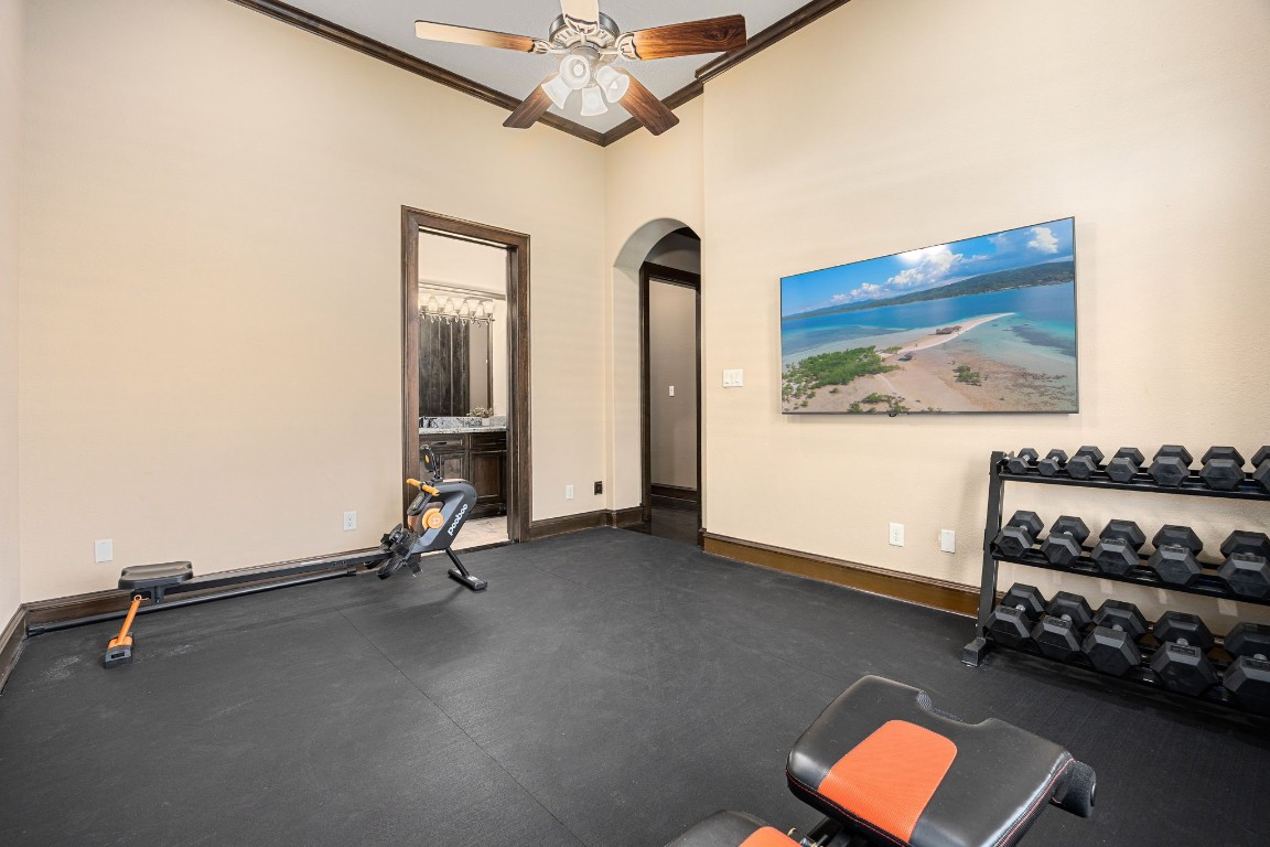 27302 Keystone Bend Court Spring, TX 77386 - Photo 26 of 50 downstairs bedroom is currently being used as a gym. It includes a large walk in closet and ensuite full bathroom