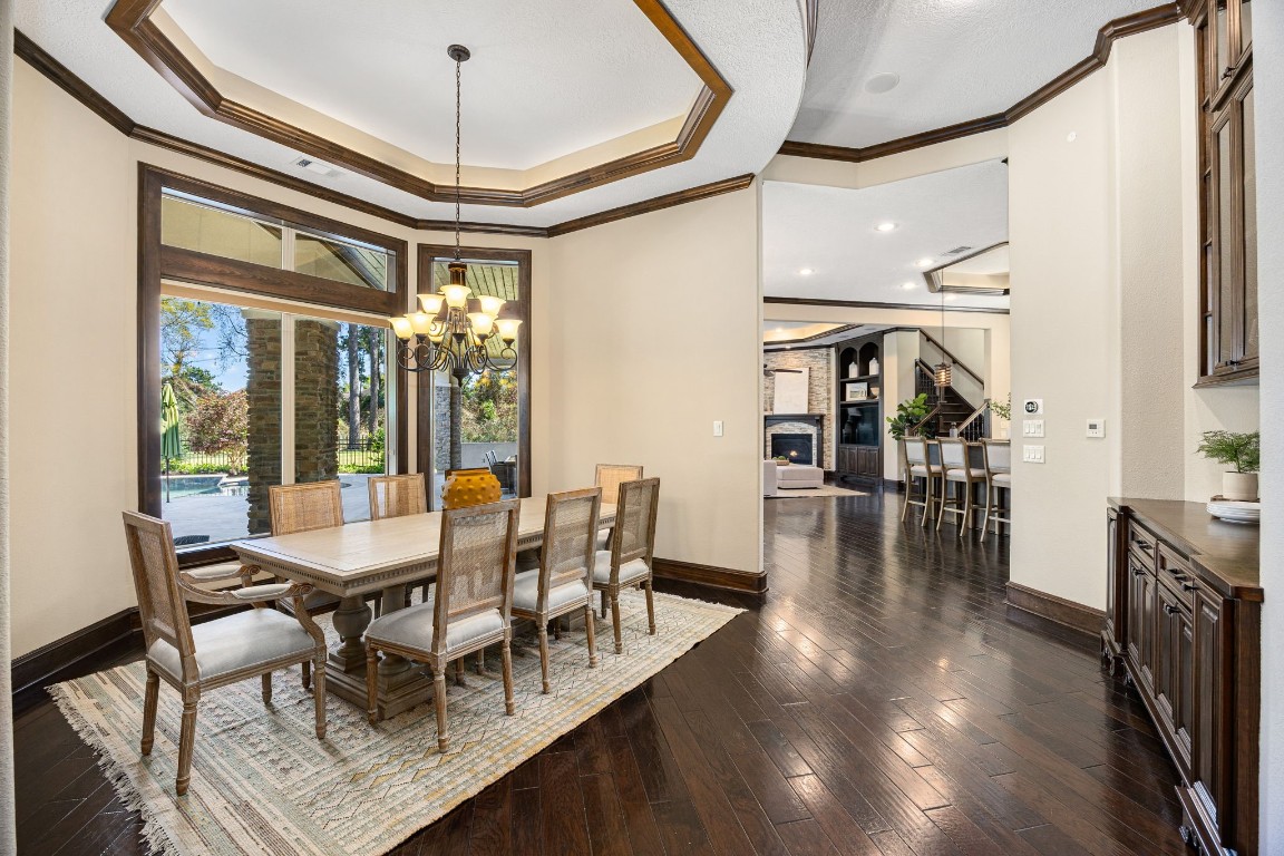 27302 Keystone Bend Court Spring, TX 77386 - Photo 4 of 50 To the right of the foyer you will find the formal dining room. This room is large and also has views of the pool