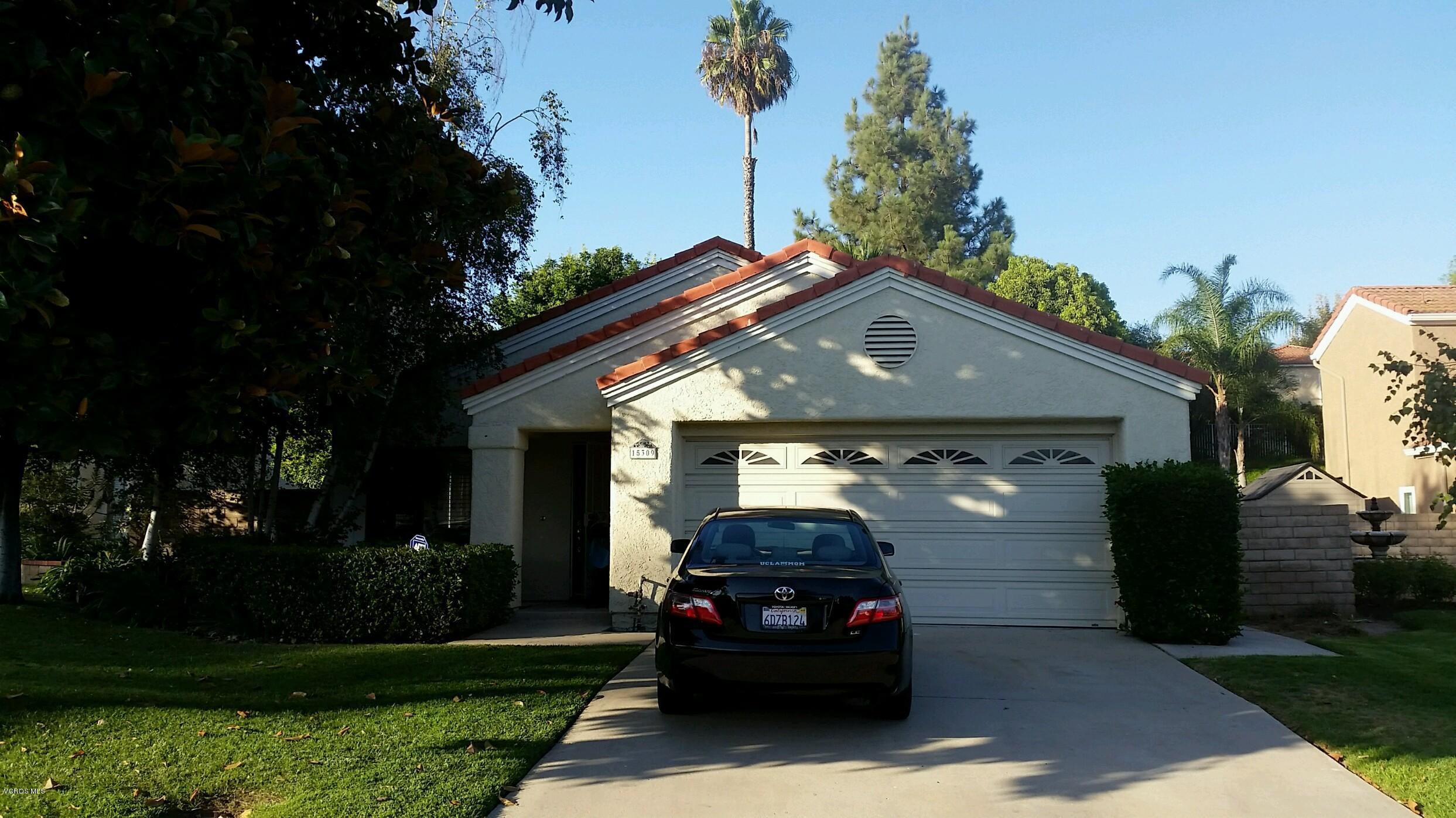 15309 Rains Court Moorpark, CA 93021 - Photo 1 of 1 a front view of a house with a garden