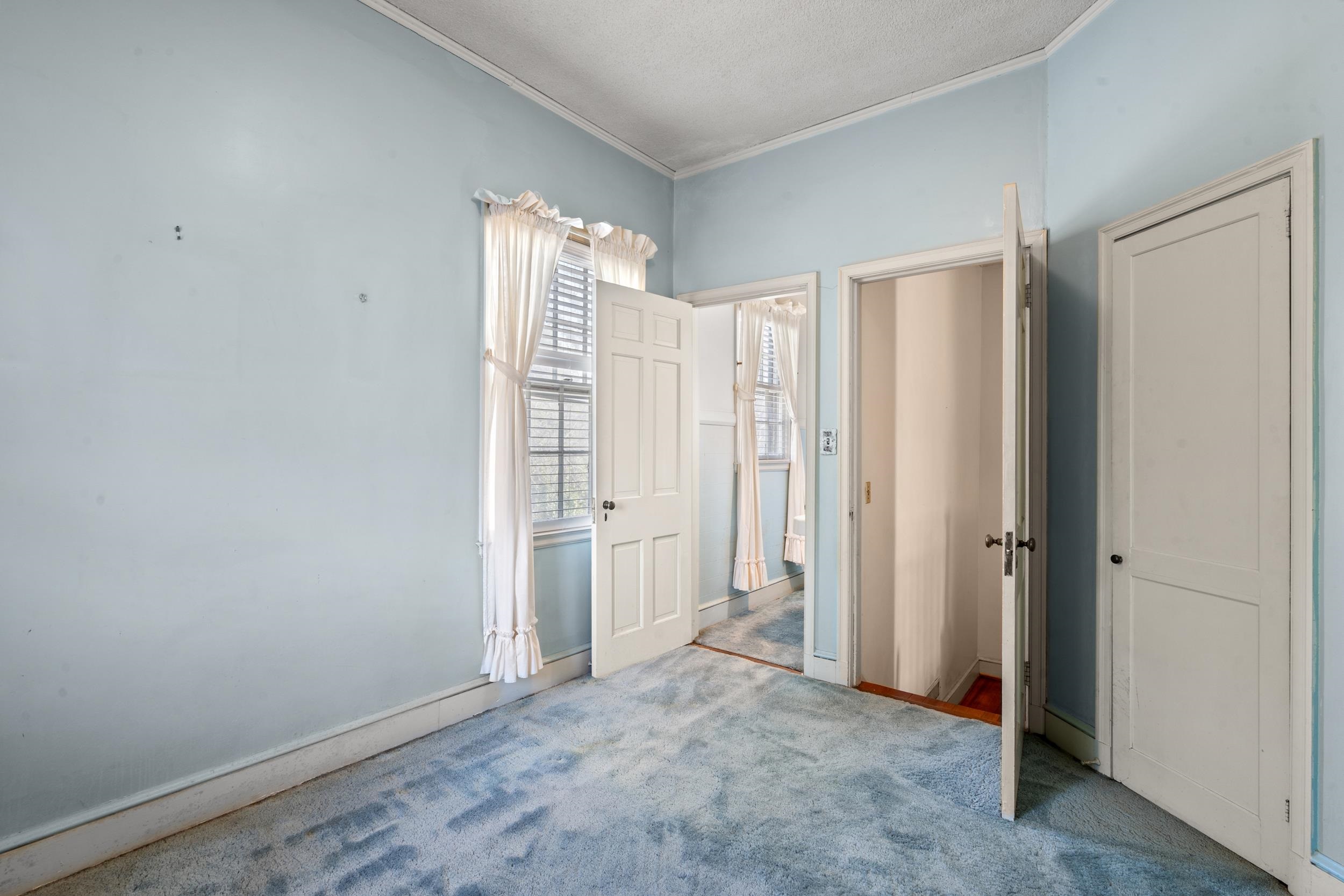 426 North Park Street Mullins, SC 29574 - Photo 26 of 39 Unfurnished bedroom featuring crown molding and carpet floors