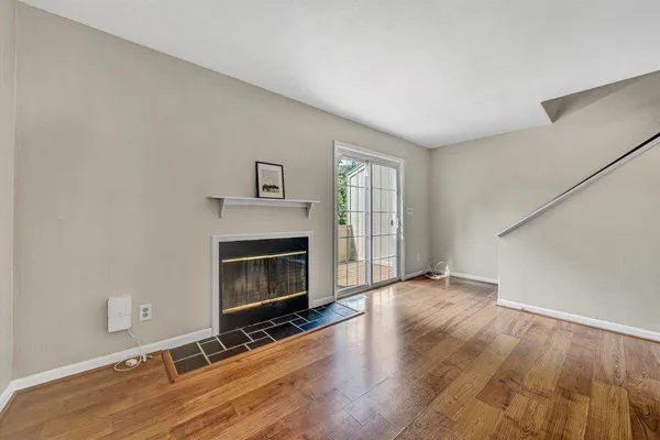 a view of balcony with wooden floor