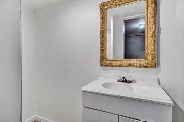 a view of a room with a large window