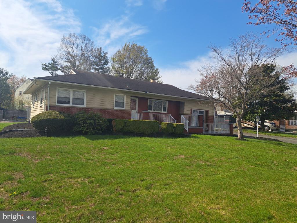 4032 Quakerbridge Road Lawrence Township, NJ 08648 - Photo 1 of 1 Charming home with lush green lawn.