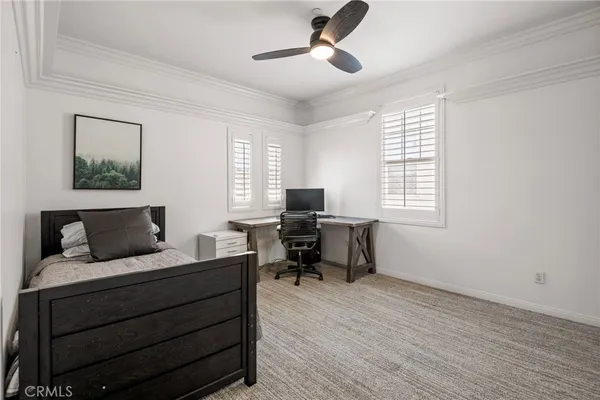 a bedroom with a bed and a closet