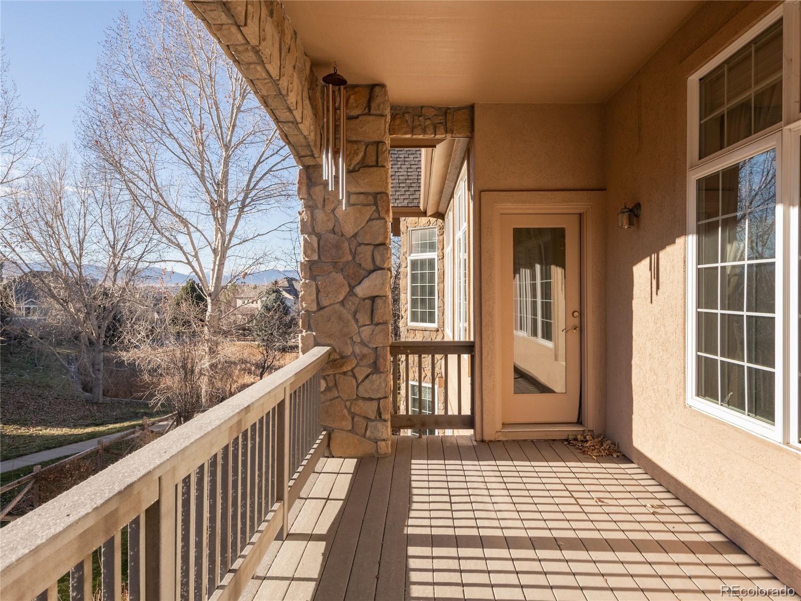 4940 West 107th Loop Westminster, CO 80031 - Photo 38 of 44 a view of a house with wooden floor