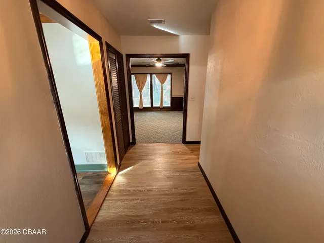 a kitchen with a sink cabinets and window