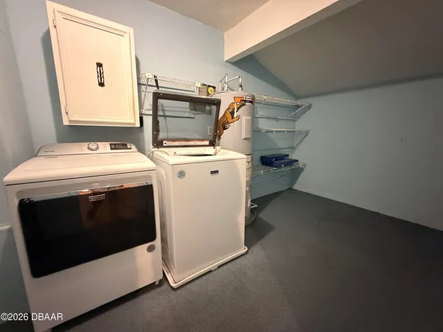 a bathroom with a granite countertop sink shower and a mirror