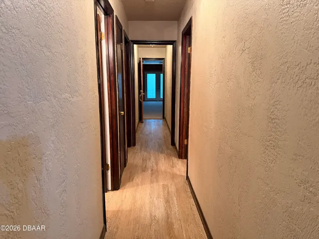 a bathroom with a toilet and shower