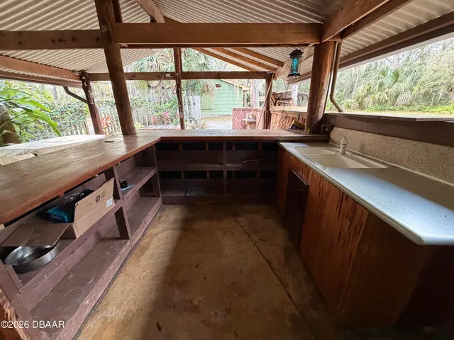 a view of a porch with furniture