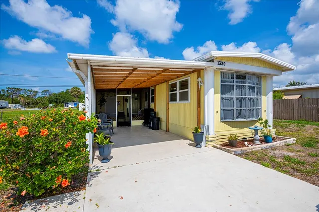 a front view of a house with a porch