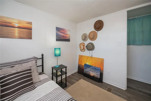 a bathroom with a toilet and a shower curtain