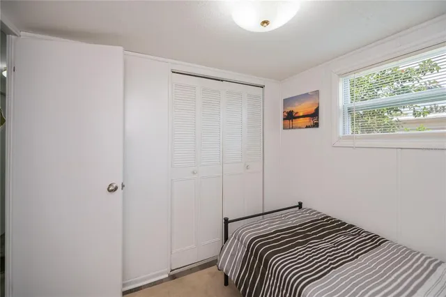 a close view of a kitchen with appliances and cabinets