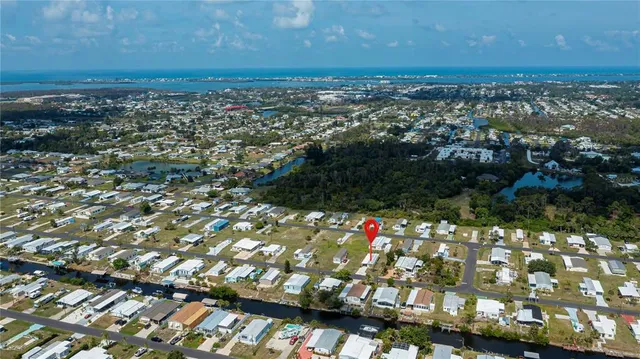 a view of a swimming pool with a garden