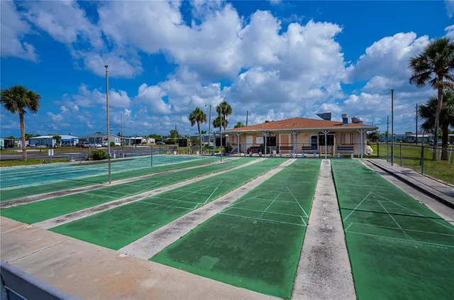 a view of a lake with a yard