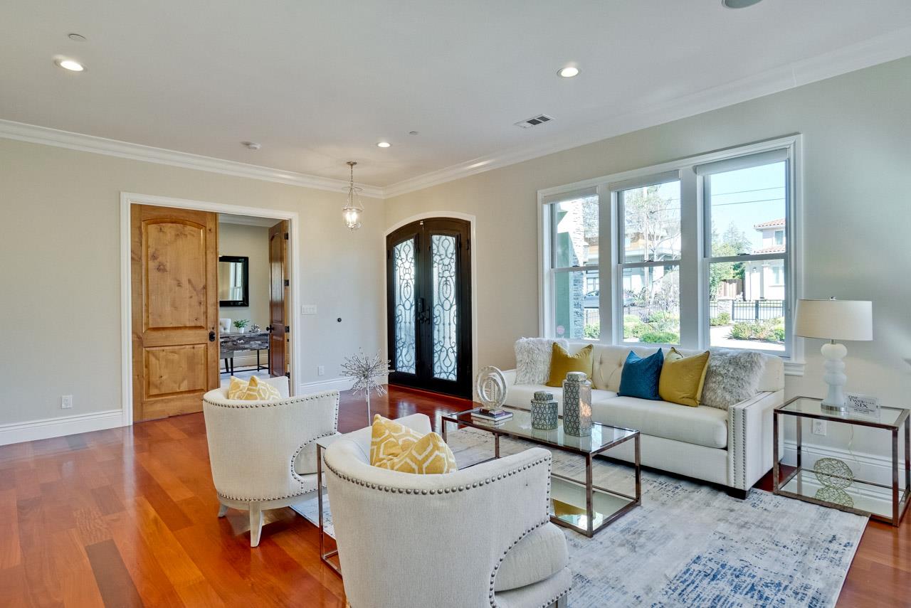 1650 Crestview Drive Los Altos, CA 94024 - Photo 11 of 50 a living room with furniture and a large window