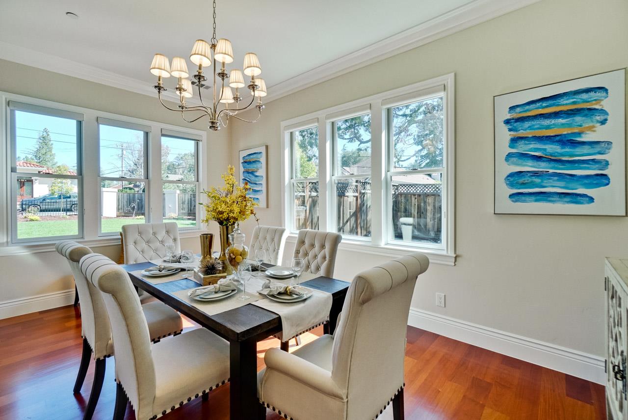 1650 Crestview Drive Los Altos, CA 94024 - Photo 12 of 50 a view of a dining room with furniture a chandelier and wooden floor