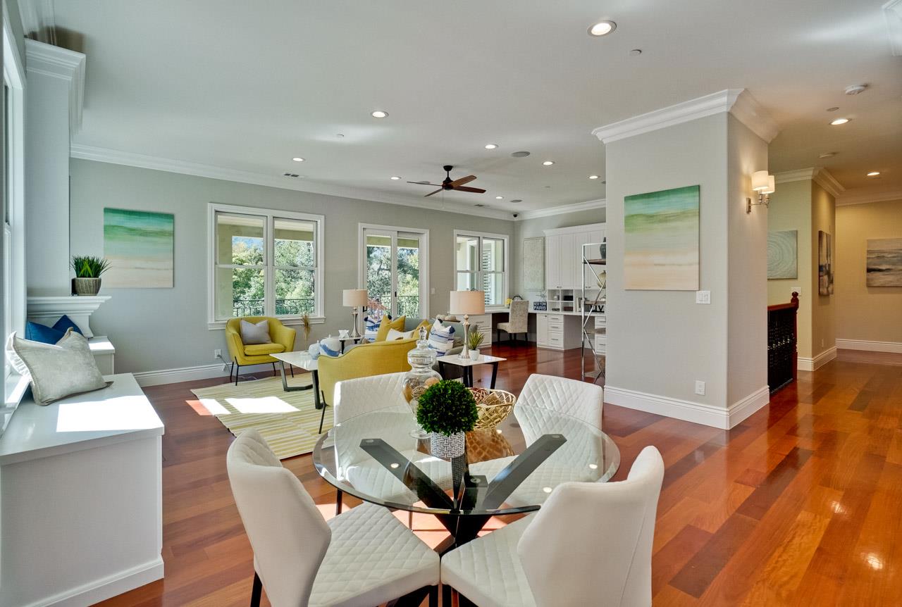 1650 Crestview Drive Los Altos, CA 94024 - Photo 20 of 50 a living room with fireplace furniture and a large window