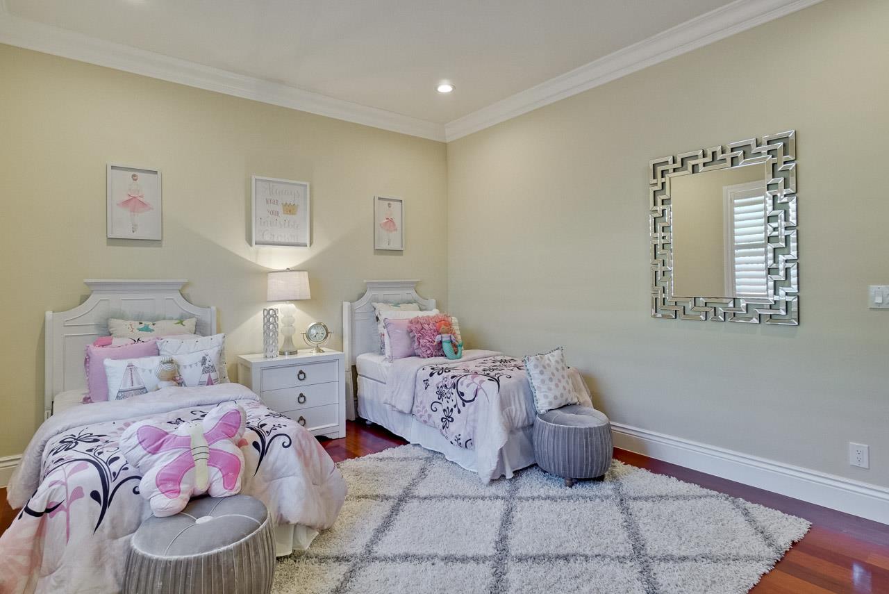 1650 Crestview Drive Los Altos, CA 94024 - Photo 30 of 50 a bedroom with a bed and wooden floor