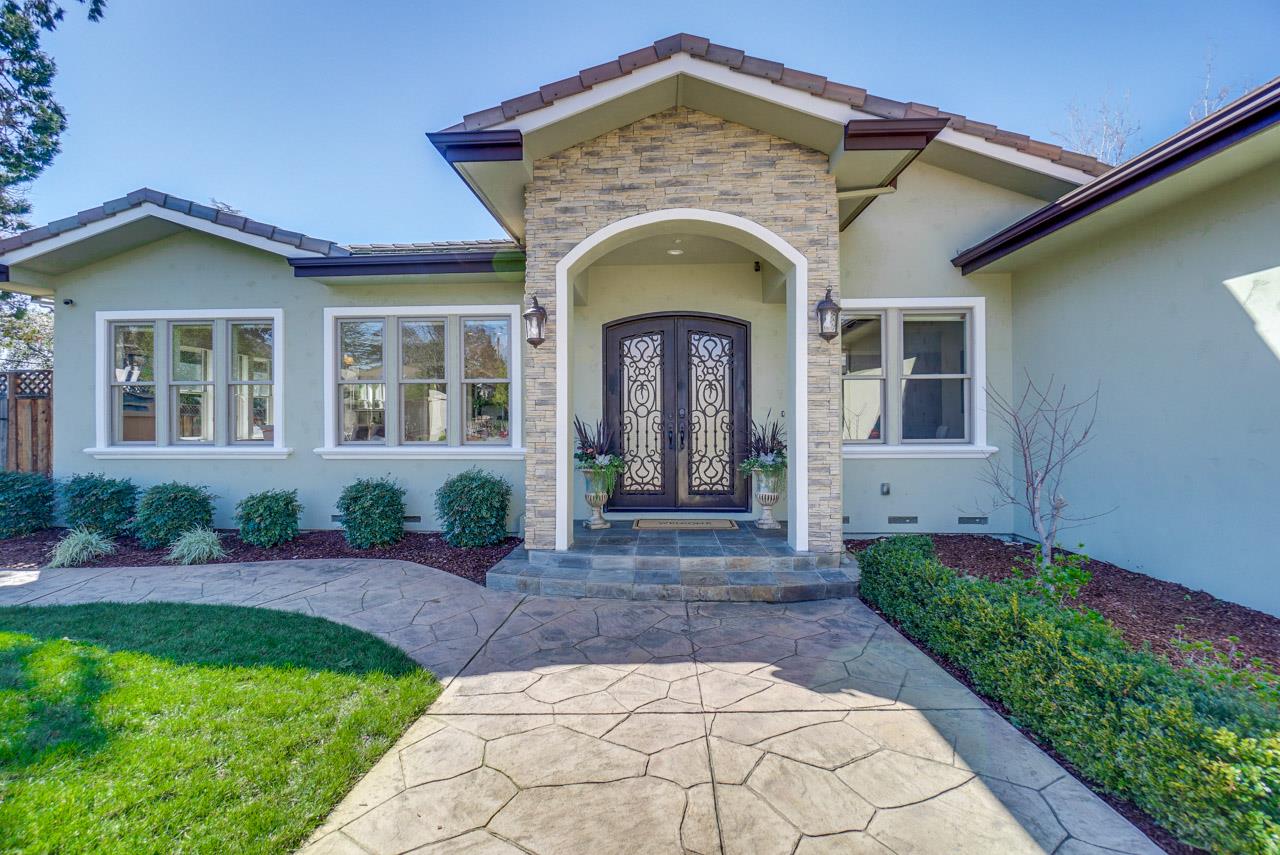 1650 Crestview Drive Los Altos, CA 94024 - Photo 3 of 50 a front view of a house with garden