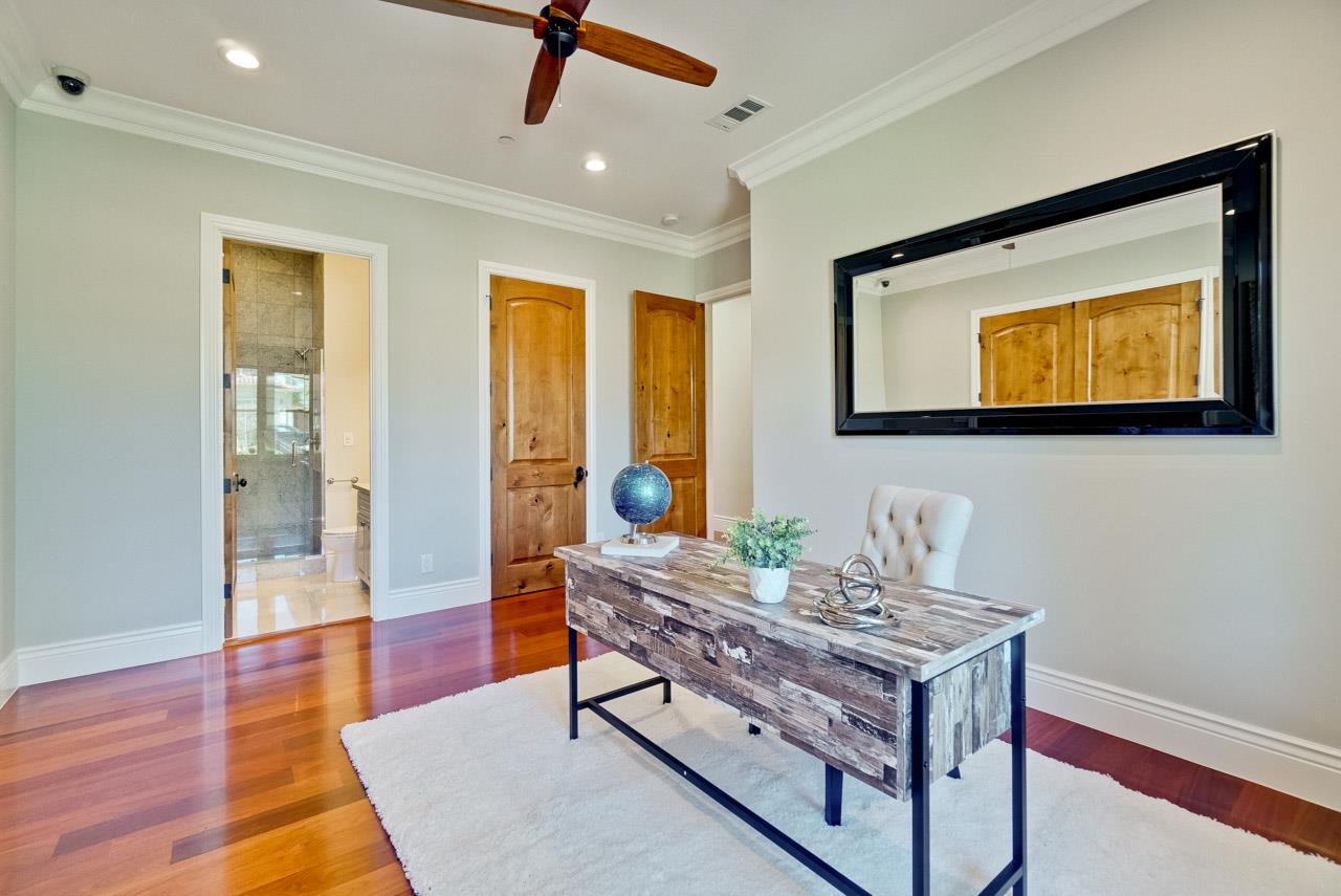 1650 Crestview Drive Los Altos, CA 94024 - Photo 32 of 50 a living room with furniture and a flat screen tv
