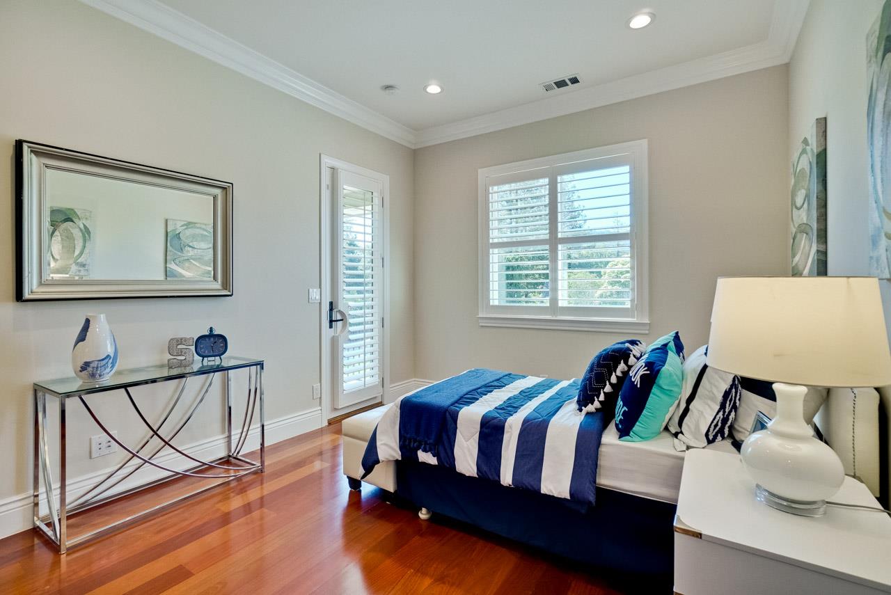 1650 Crestview Drive Los Altos, CA 94024 - Photo 37 of 50 a bedroom with furniture and a window