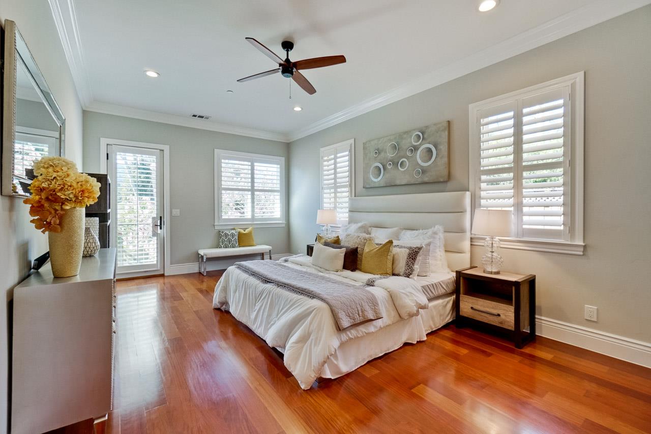 1650 Crestview Drive Los Altos, CA 94024 - Photo 39 of 50 a bedroom with a large bed chandelier and a window