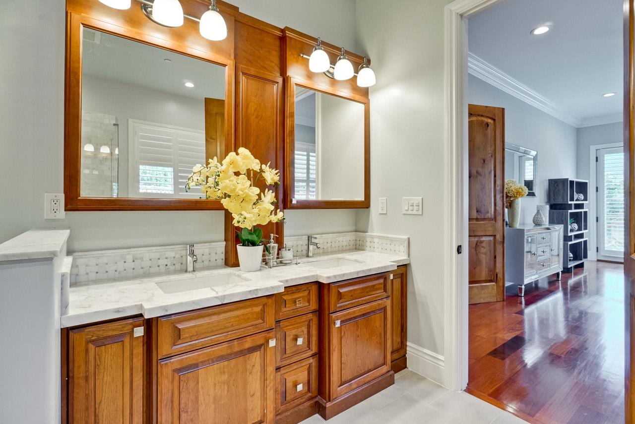 1650 Crestview Drive Los Altos, CA 94024 - Photo 42 of 50 a bathroom with a sink and a mirror