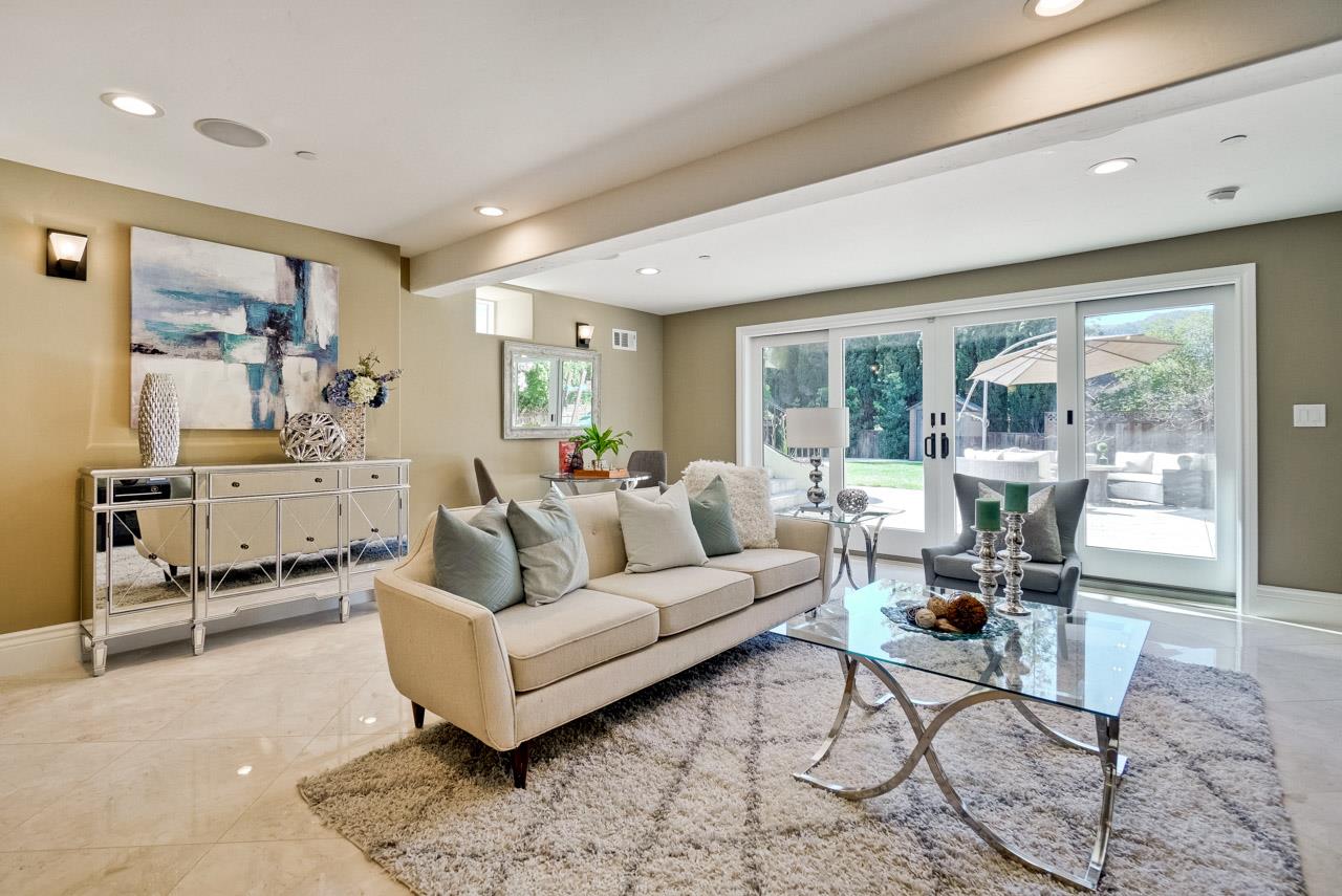 1650 Crestview Drive Los Altos, CA 94024 - Photo 46 of 50 a living room with furniture and a large window