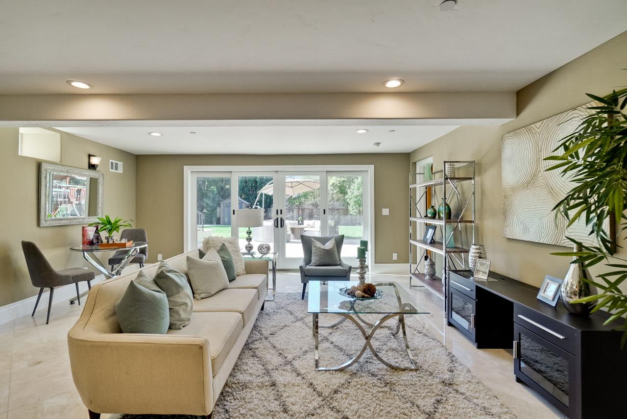 1650 Crestview Drive Los Altos, CA 94024 - Photo 48 of 50 a living room with furniture and a potted plant