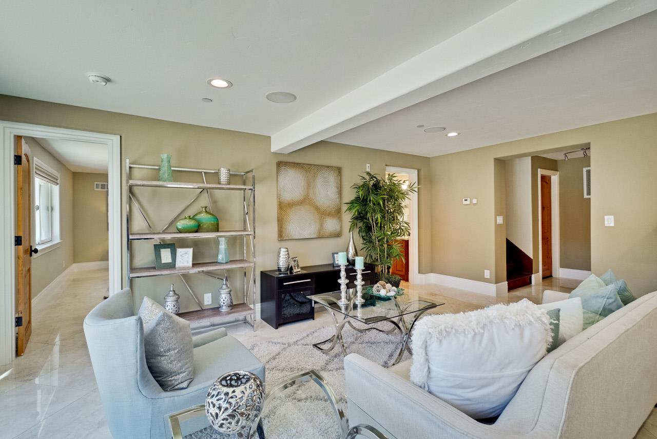 1650 Crestview Drive Los Altos, CA 94024 - Photo 49 of 50 a living room with furniture and a wooden floor