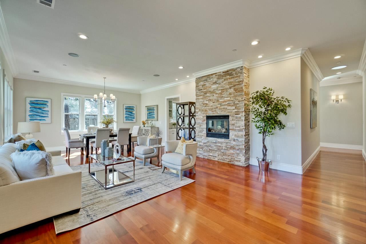 1650 Crestview Drive Los Altos, CA 94024 - Photo 6 of 50 a living room with furniture wooden floor and a fireplace
