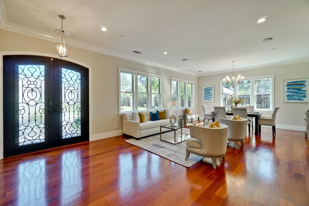 1650 Crestview Drive Los Altos, CA 94024 - Photo 8 of 50 a living room with fireplace furniture and a wooden floor