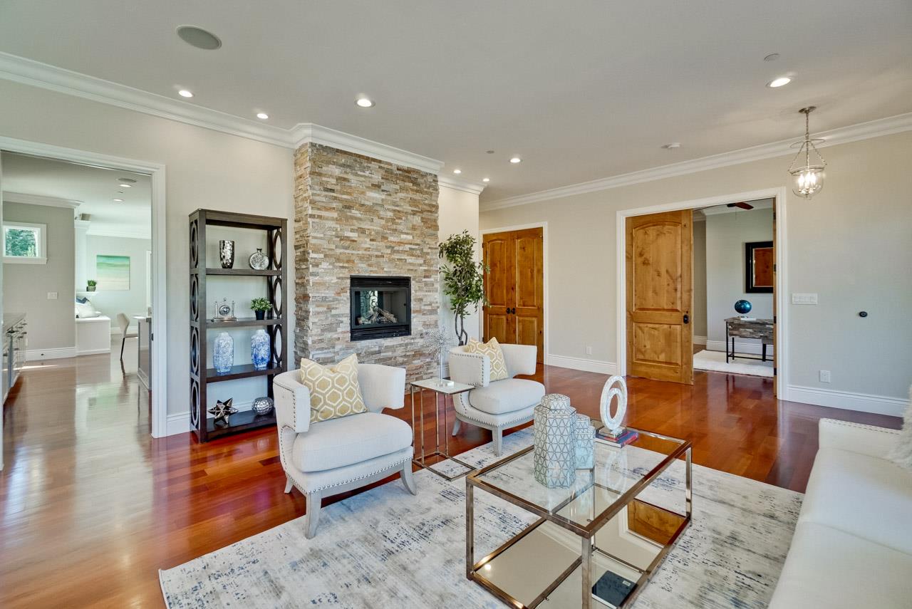 1650 Crestview Drive Los Altos, CA 94024 - Photo 10 of 50 a living room with furniture and wooden floor
