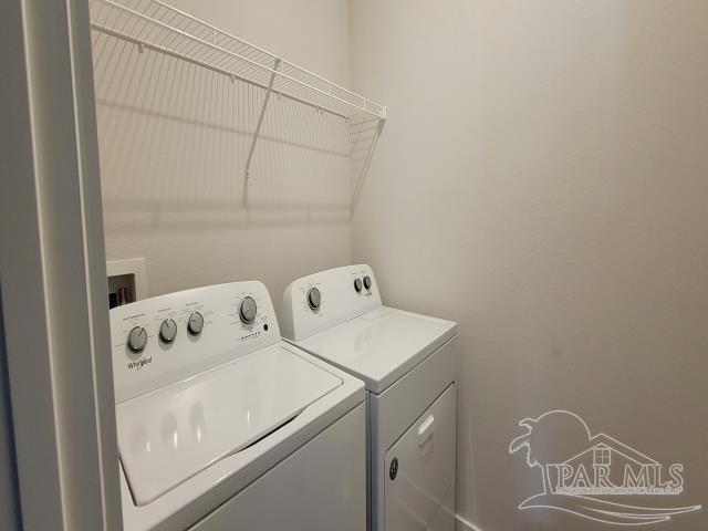 5748 Conley Court Pace, FL 32571 - Photo 14 of 22 a utility room with dryer and washer