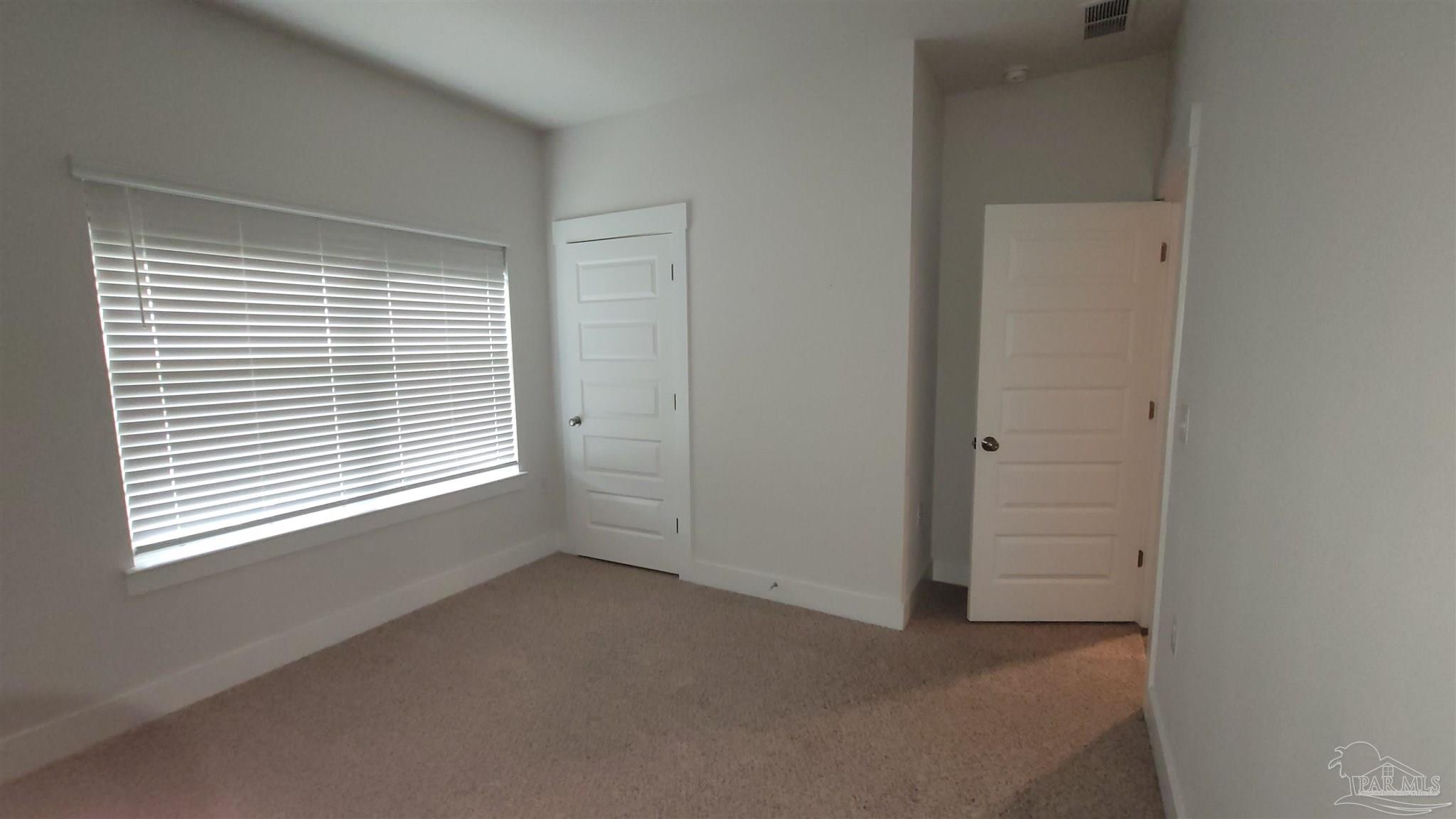 5748 Conley Court Pace, FL 32571 - Photo 19 of 22 an empty room with a window